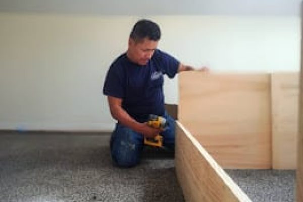 Tacupro employees performing professional carpentry work during home remodeling project